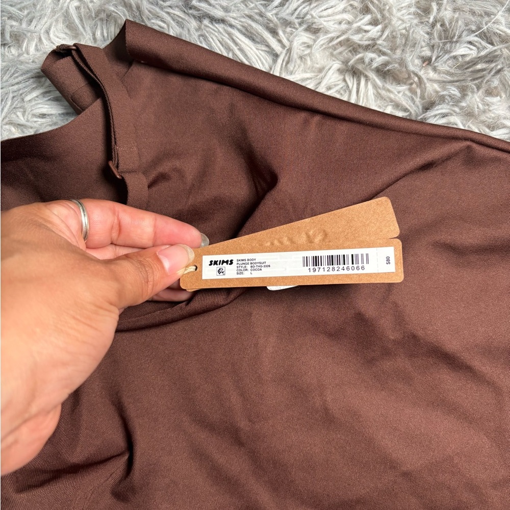 SKIMS  Unlined Plunge Thong Bodysuit NWT - Picture 5 of 10